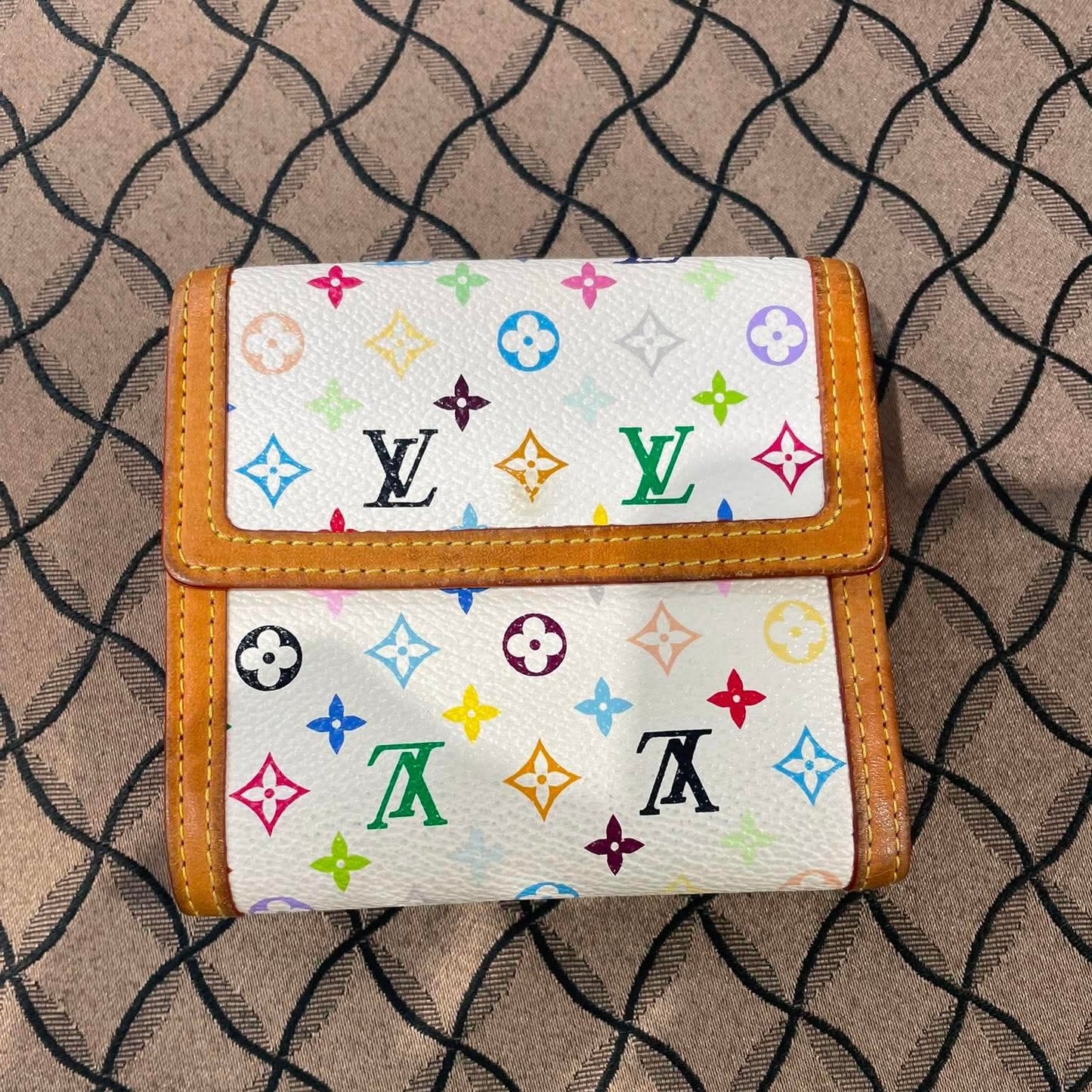 Louis Vuitton
Multicolor Portefeuille Elise Trifold Wallet White
(Customer Reserved)
